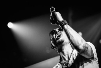 BURBANK, CA - MAY 22: (EDITORS NOTE: Image has been converted to black and white.) Chester Bennington of Linkin Park performs on stage at the iHeartRadio Album Release Party presented by State Farm at the iHeartRadio Theater Los Angeles on May 22, 2017 in Burbank, California. (Photo by Rich Fury/Getty Images for iHeartMedia)